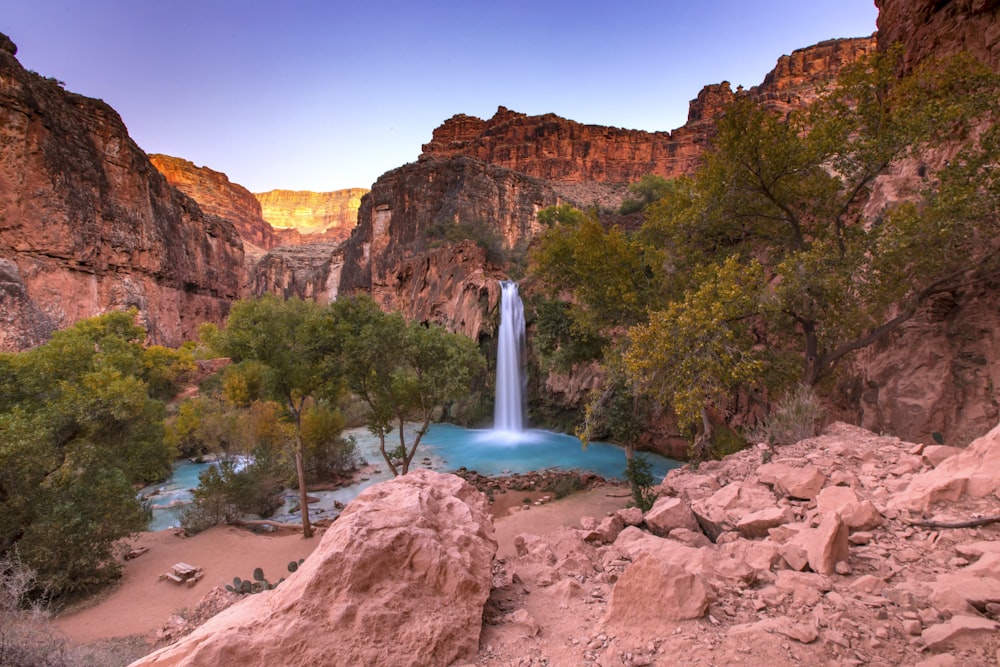 a waterfall in a canyon