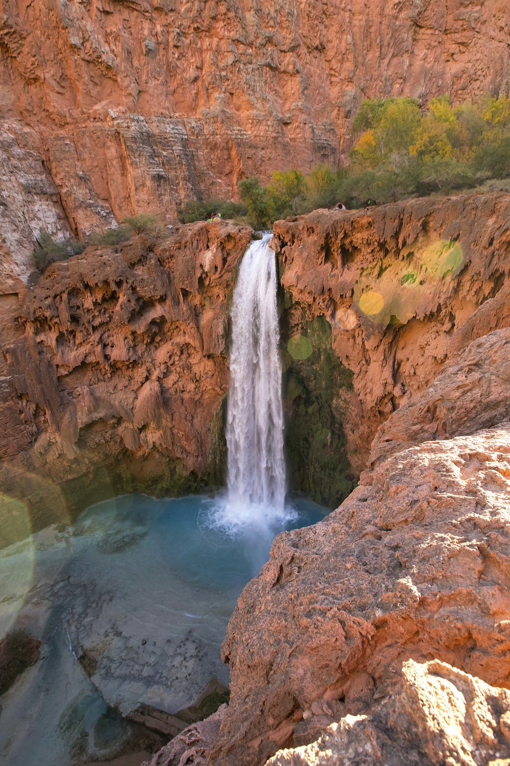 a waterfall in a rocky area