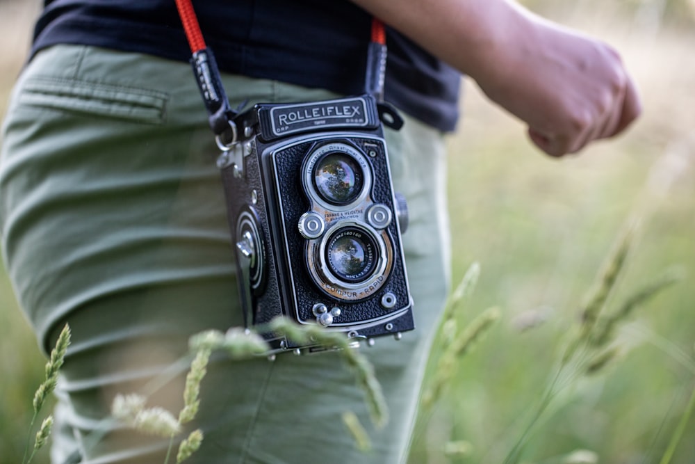 a camera in a person's lap