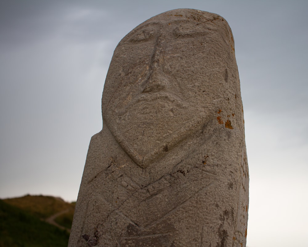 a large rock with a hole in it