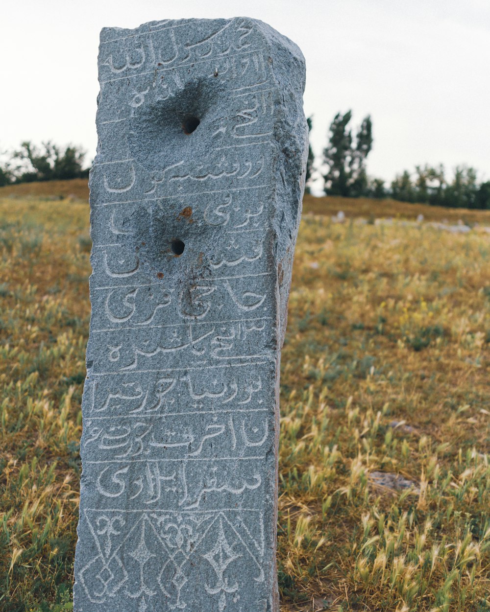 a stone with writing on it