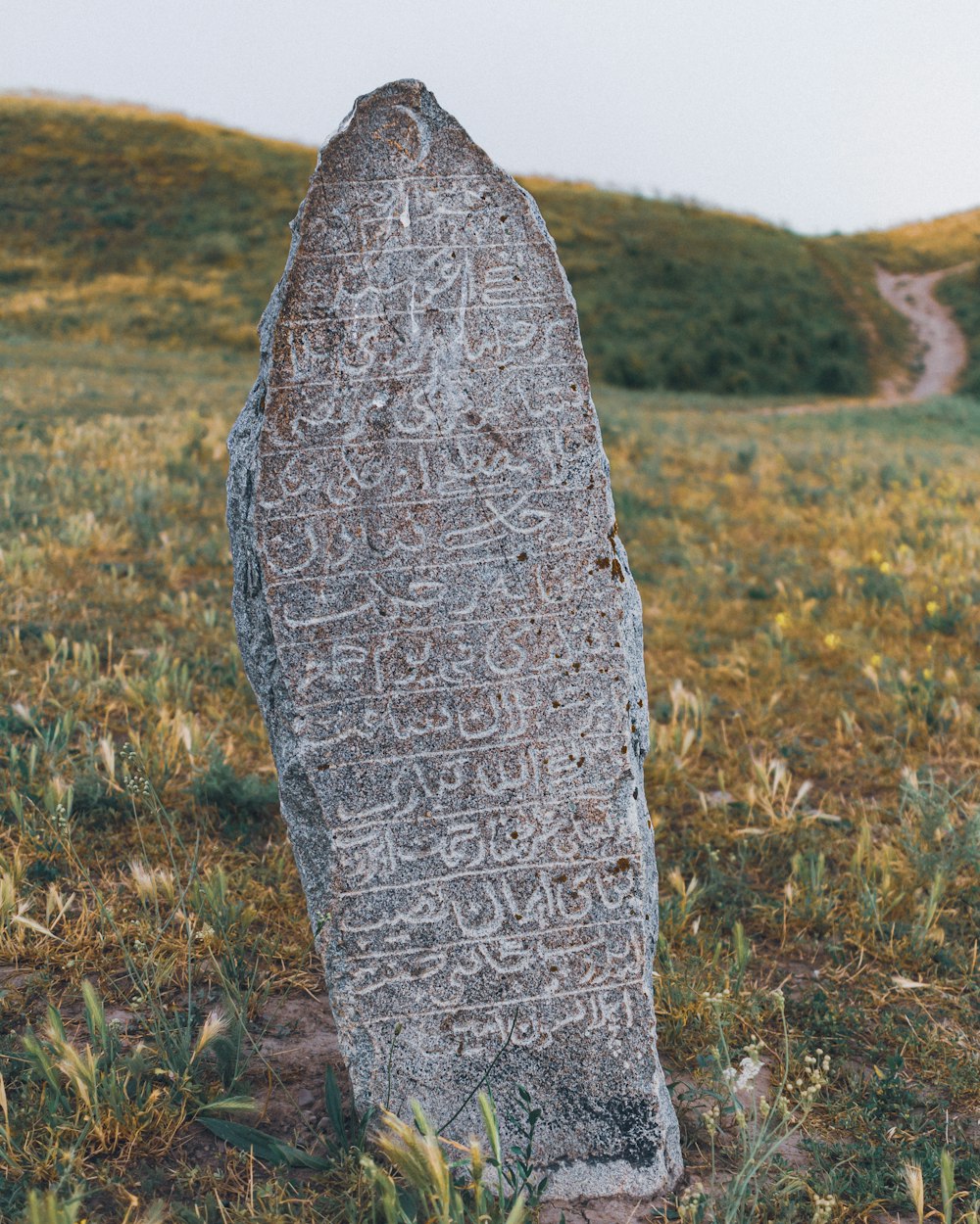 a stone with writing on it
