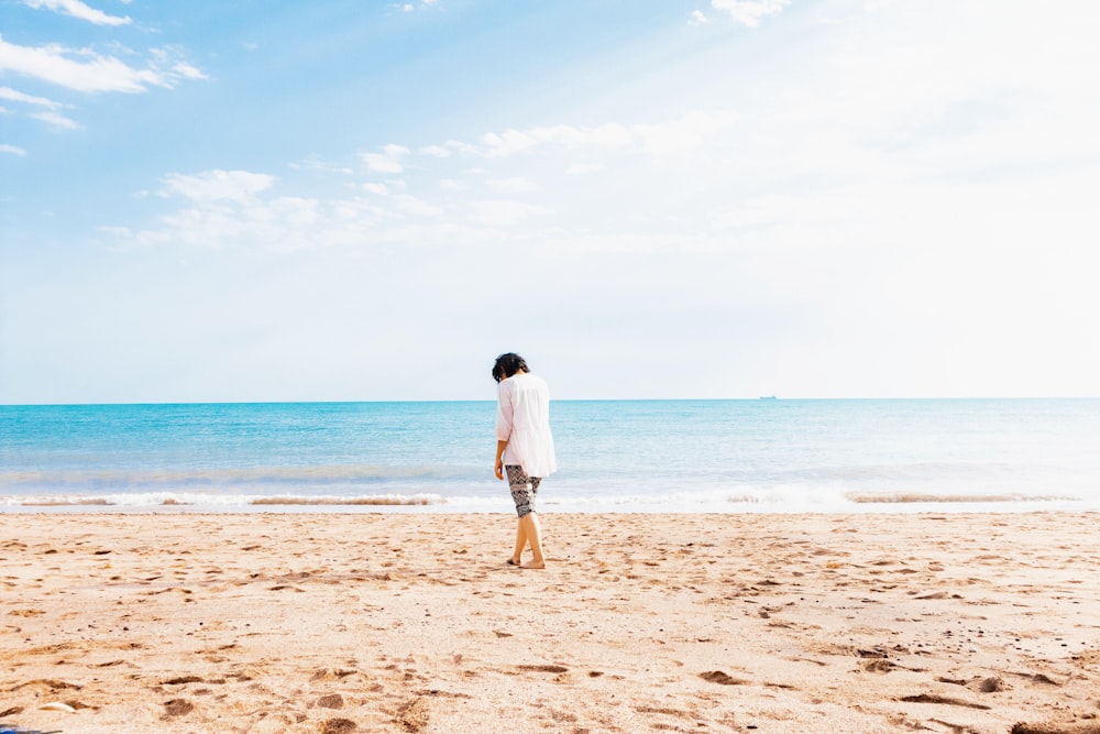 a person standing on a beach