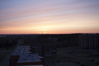 Sunset over Celina residential development showing streets and lot layouts.