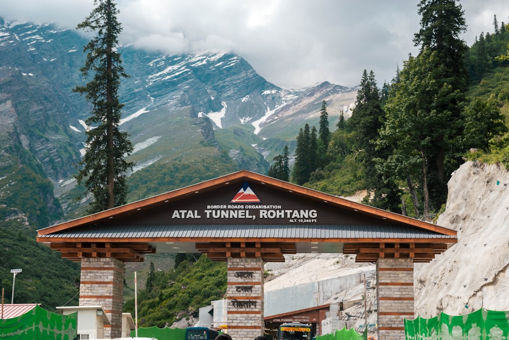 a building with a mountain in the background