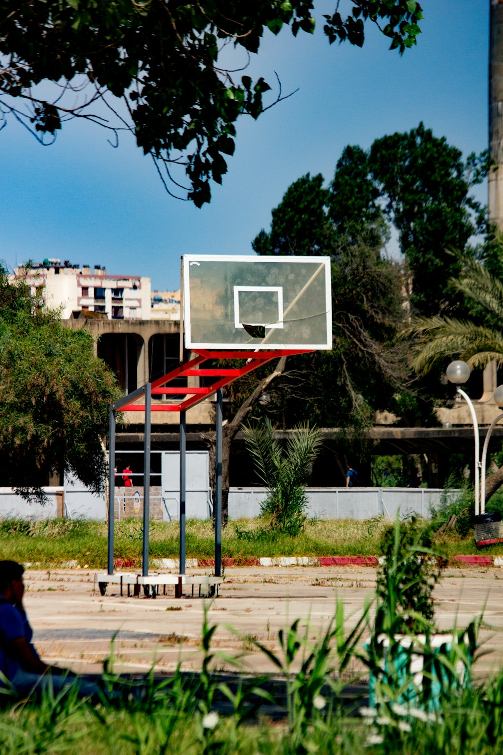 a basketball hoop in a park