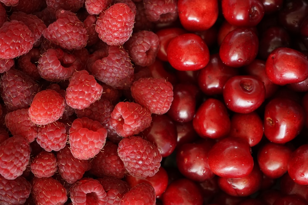 a pile of red berries