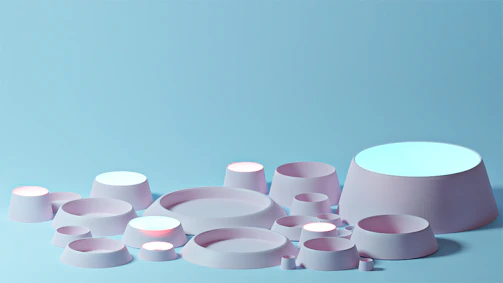 A collection of gentle, pastel-colored calming tools arranged neatly on a soft surface.