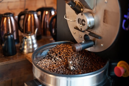 a metal pot with a brown substance in it