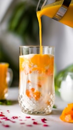 a glass with a liquid in it