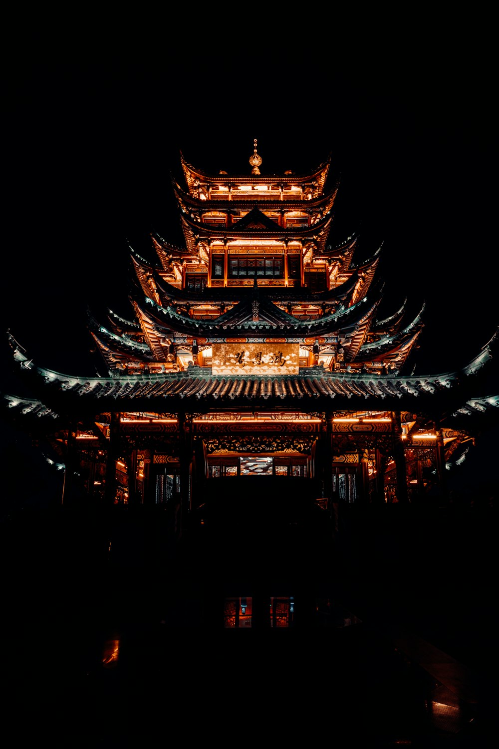 a clock tower lit up at night