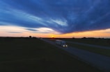 a sunset over a road