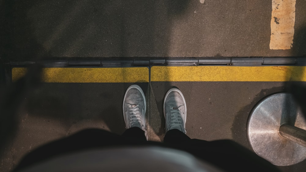 a person's feet on a train