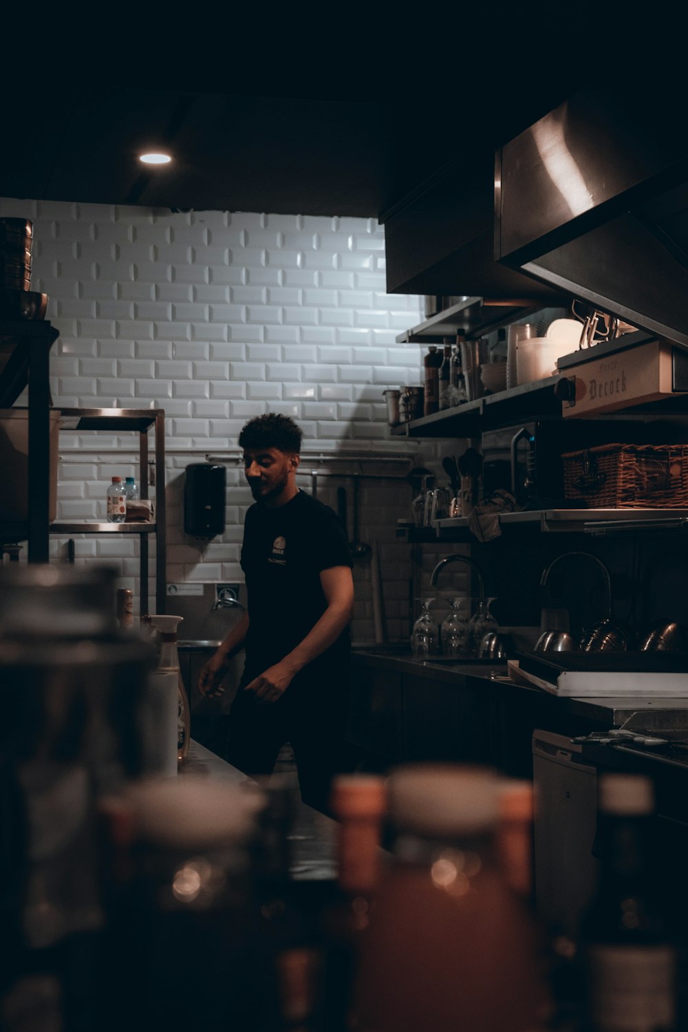 a man standing in a kitchen