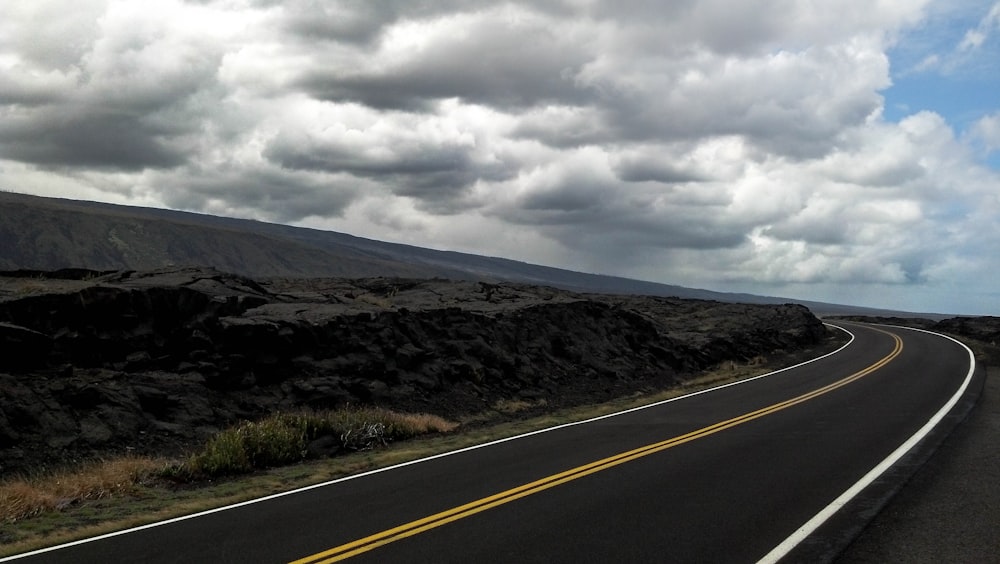 a road with hills on the side