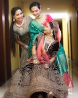 a couple of women in dresses