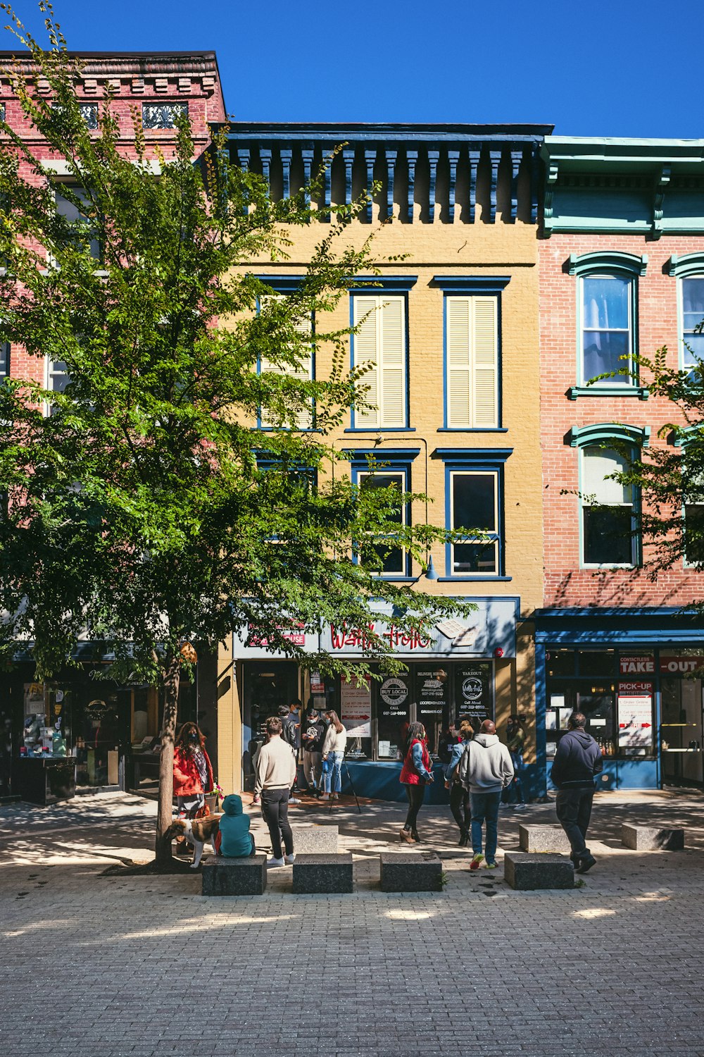 a group of people outside of a building