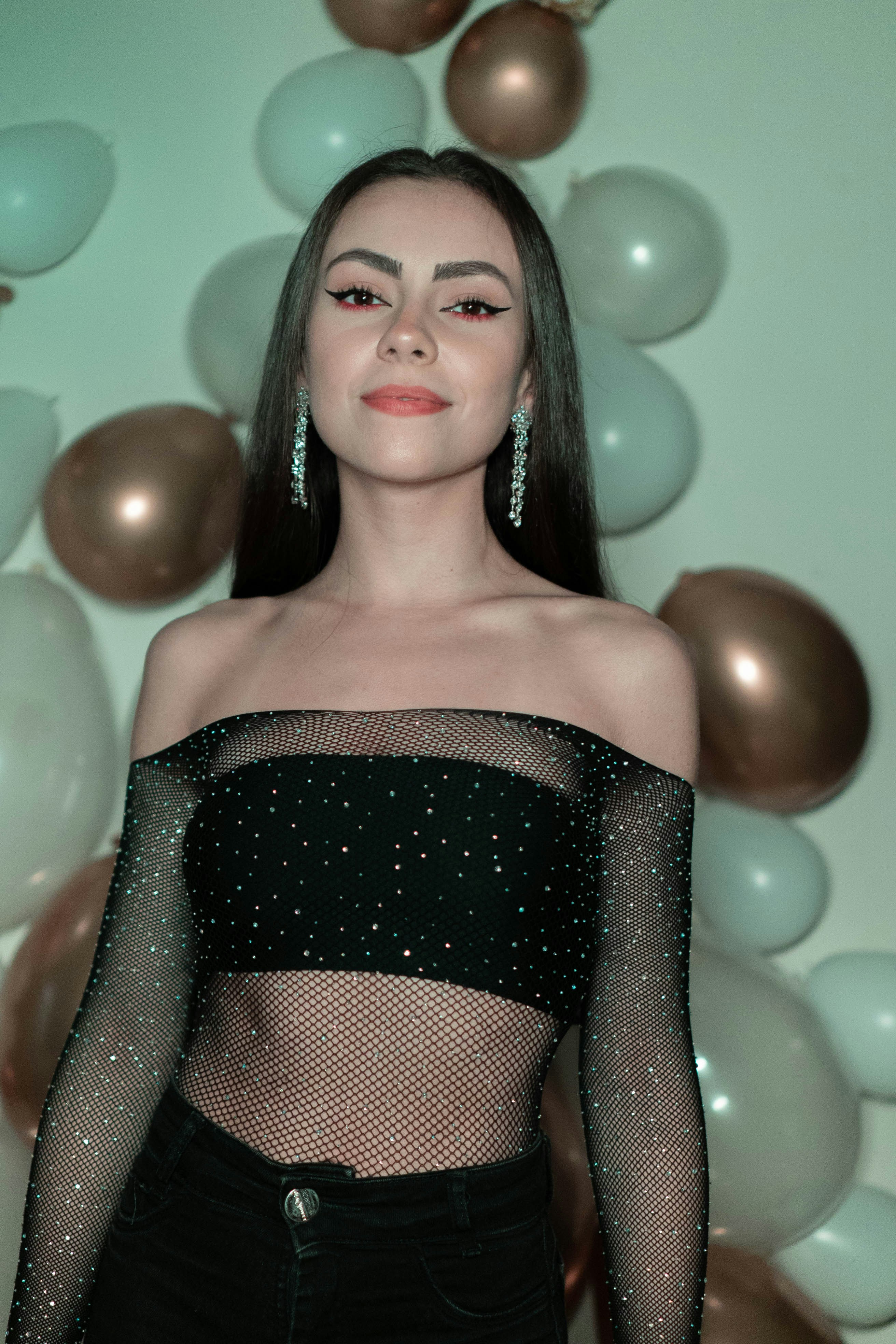 A woman with a black dress photo – Free Green Image on Unsplash