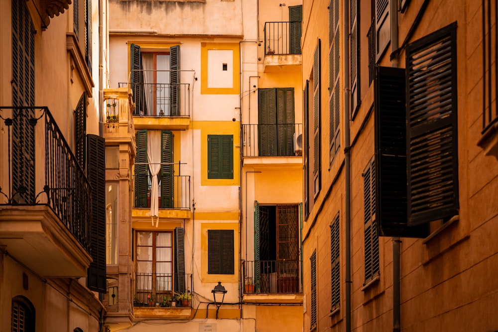 a row of buildings with balconies