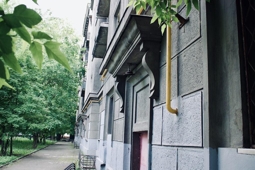 a building with a tree in the front