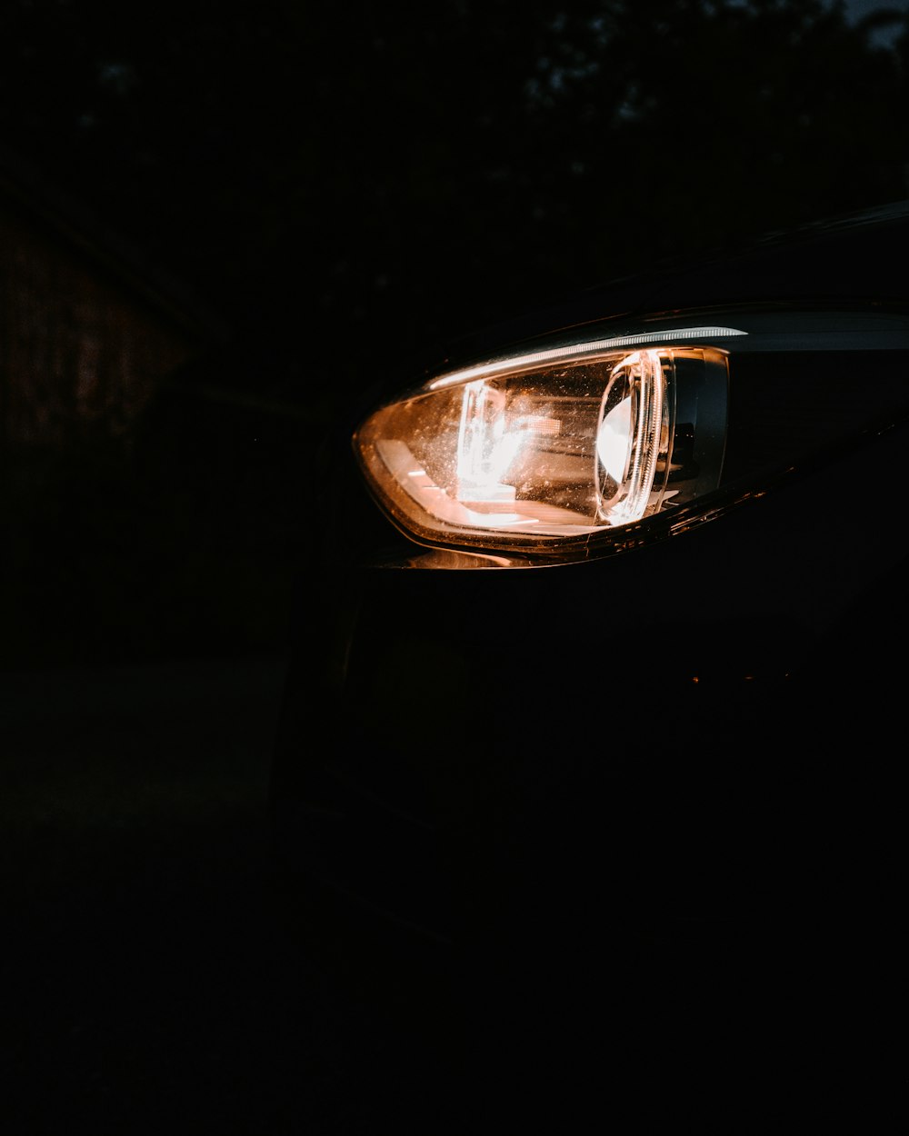 a close up of a car's headlights