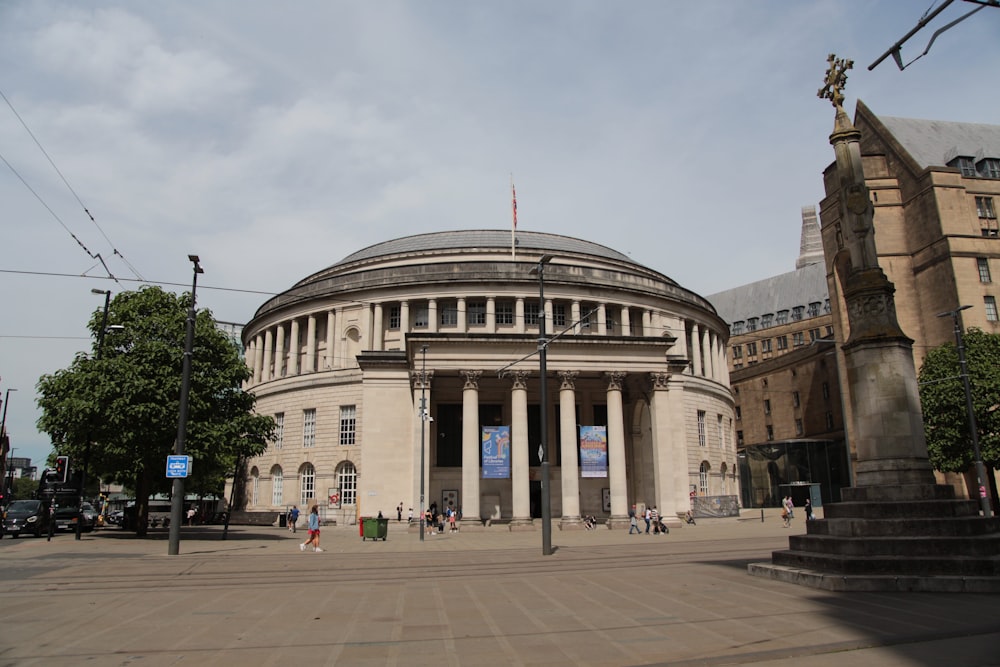 a large building with columns and a dome on top