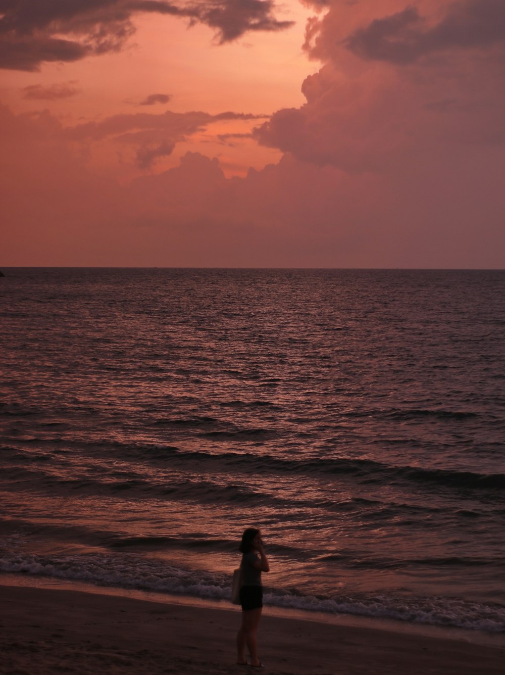 a person standing on a beach