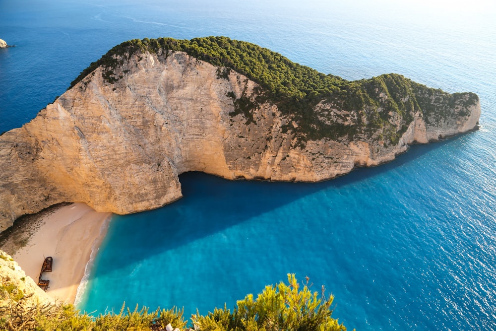 a large rock in the ocean