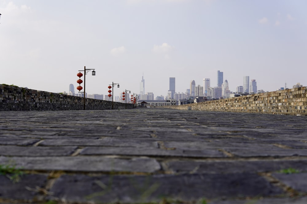 a city skyline with a red light