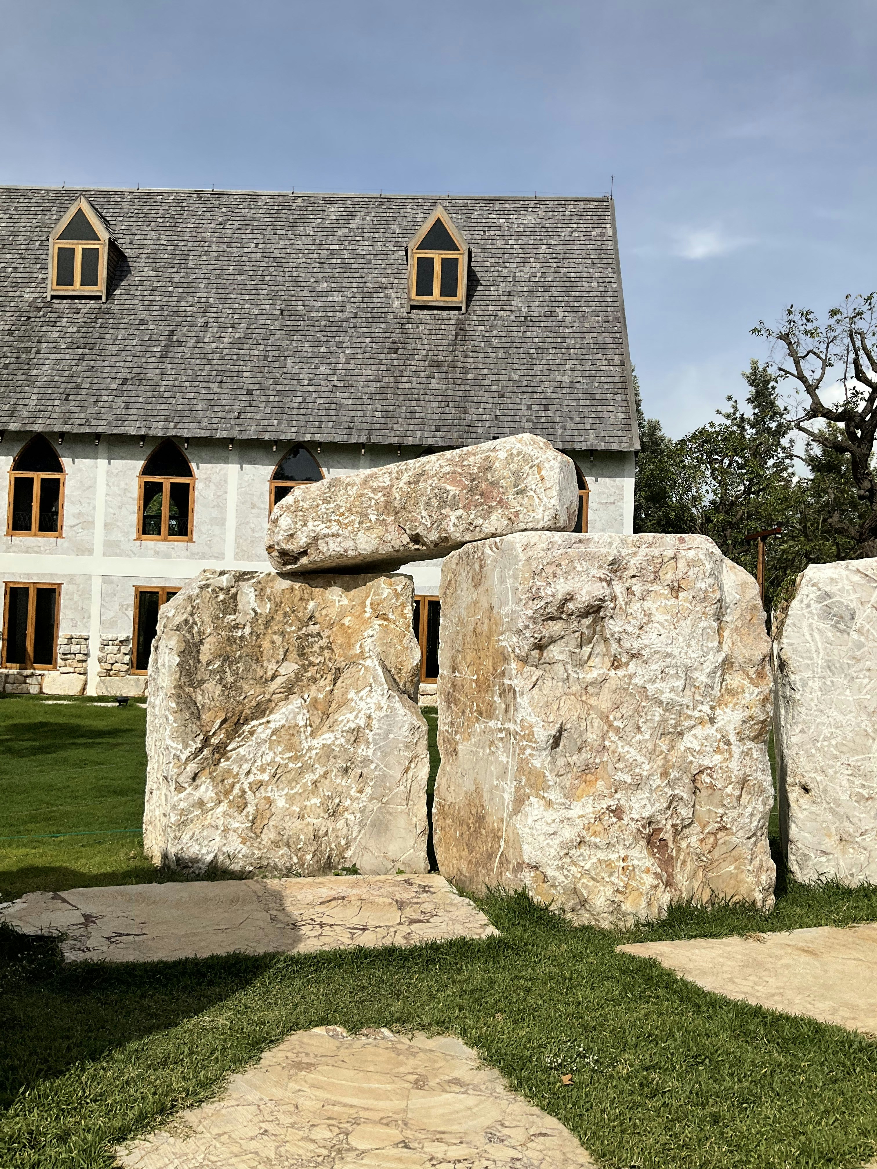 a stone building with a stone wall