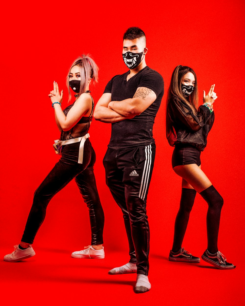 a group of people wearing masks