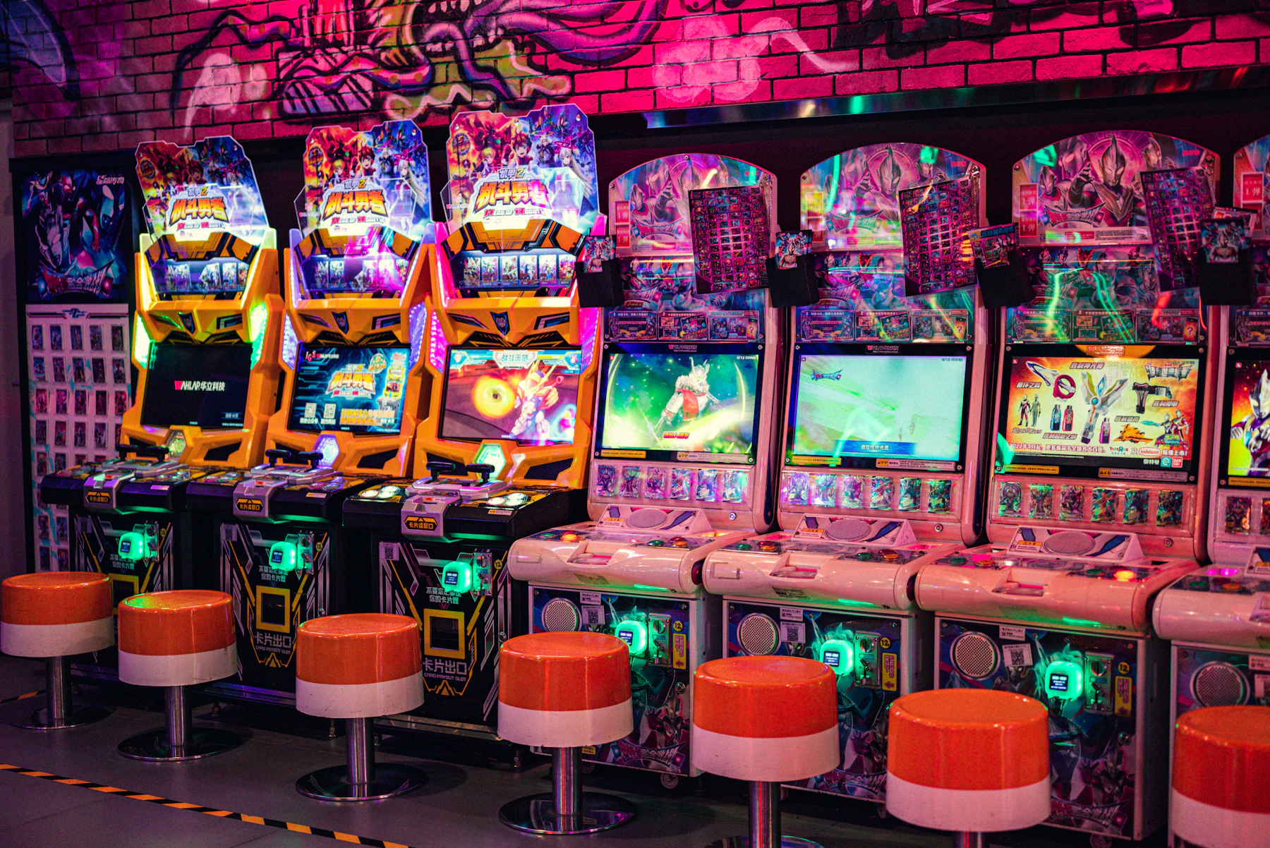 Retro arcade machines glowing under colorful neon lights