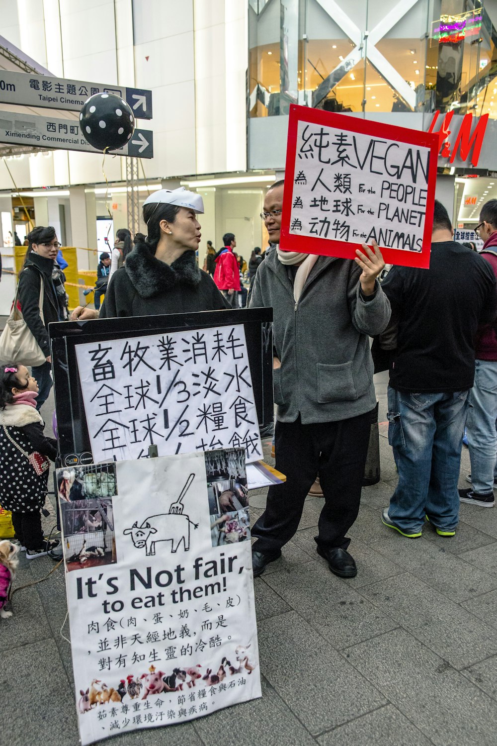 a person holding a sign