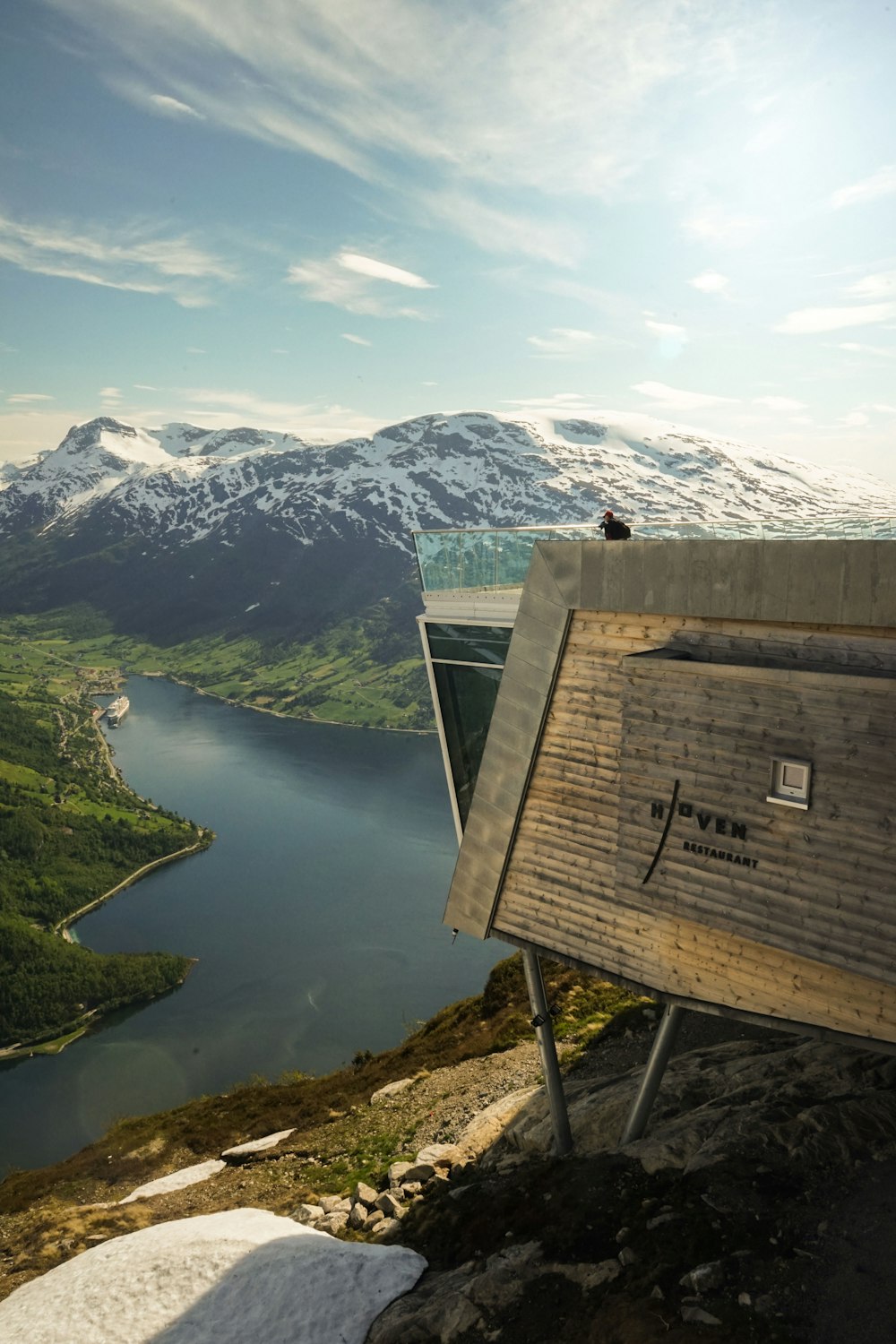 a building with a lake in the background