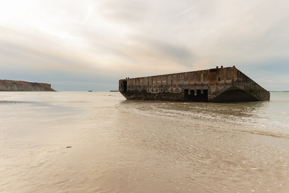 a large concrete structure in the water