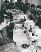 A group of people sharing a meal at a community event.