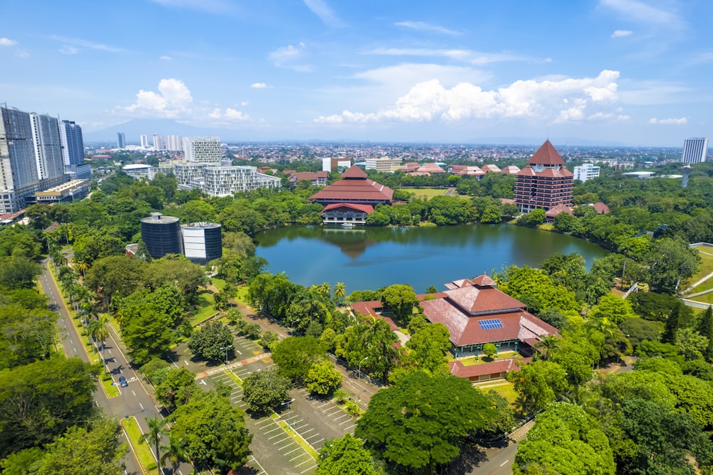 a river with buildings and trees around it