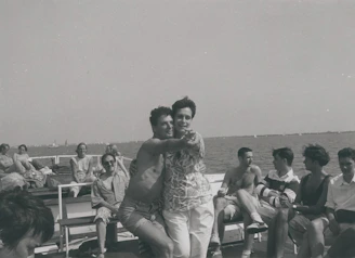 Guests participating in a lively dance class on the sunlit deck of a cruise ship.