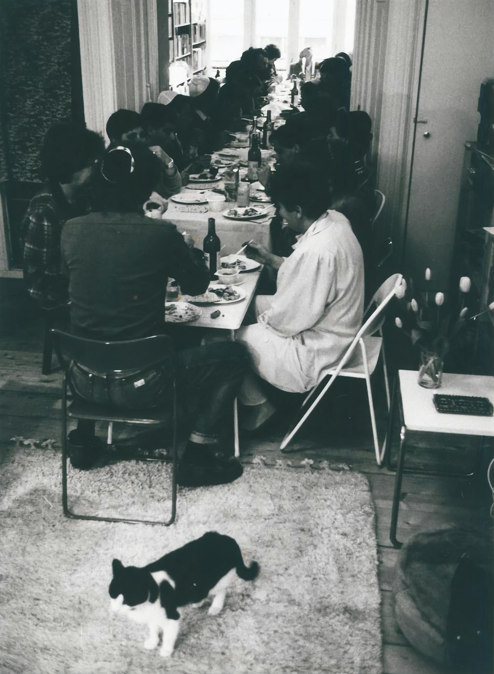 a group of people sitting at a table