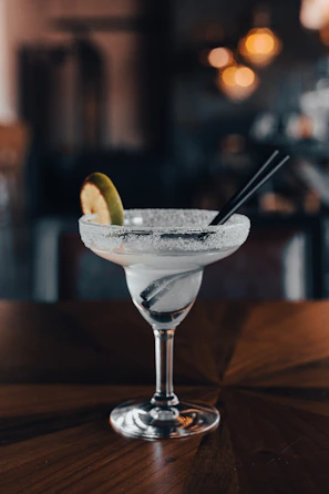 a glass with a drink in it
