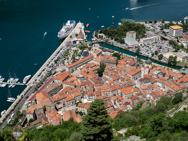 Aerial view of Kotor's Old Town and the cruise quay beside the water