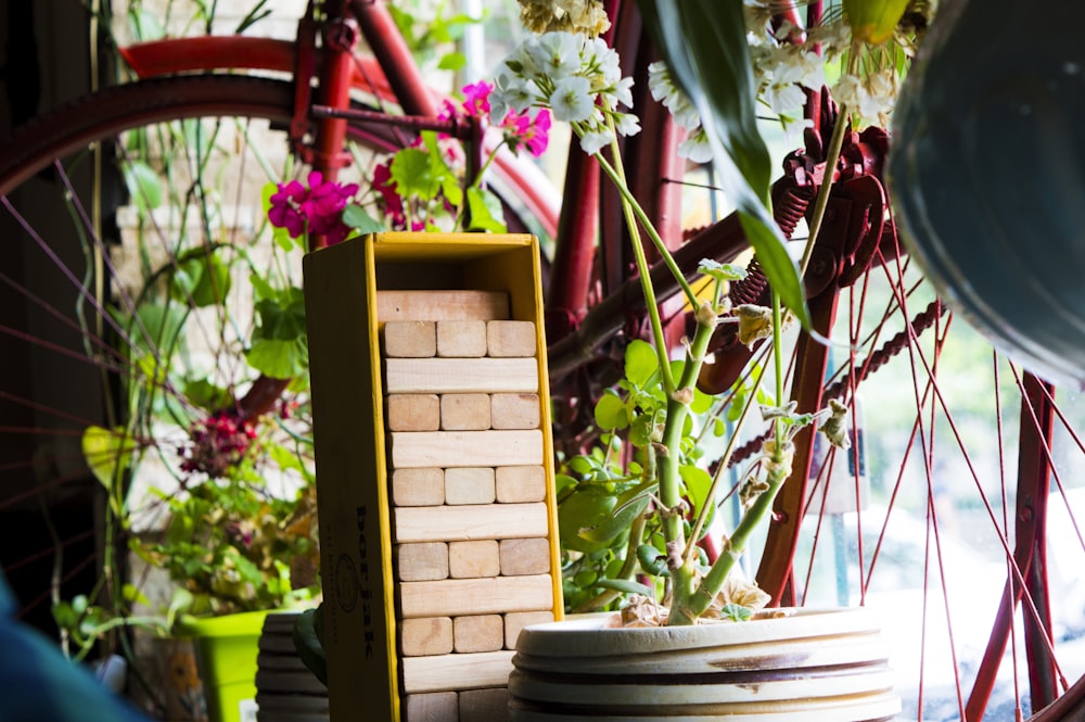 a brick chimney with flowers