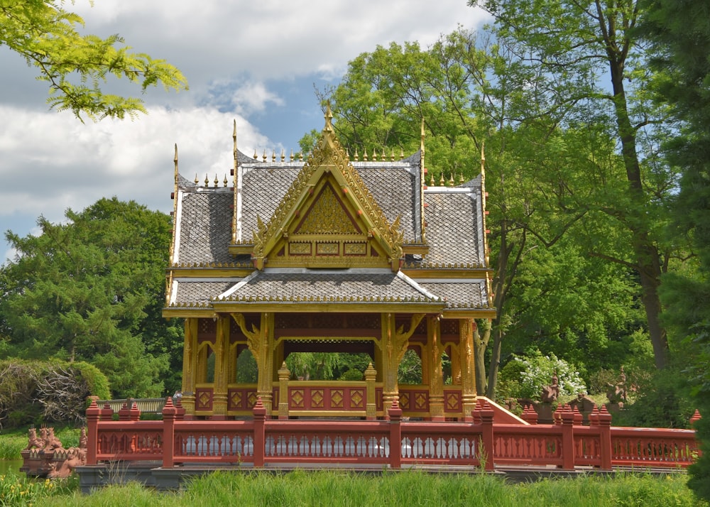 a pagoda with a red railing