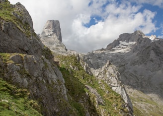a rocky mountain with snow