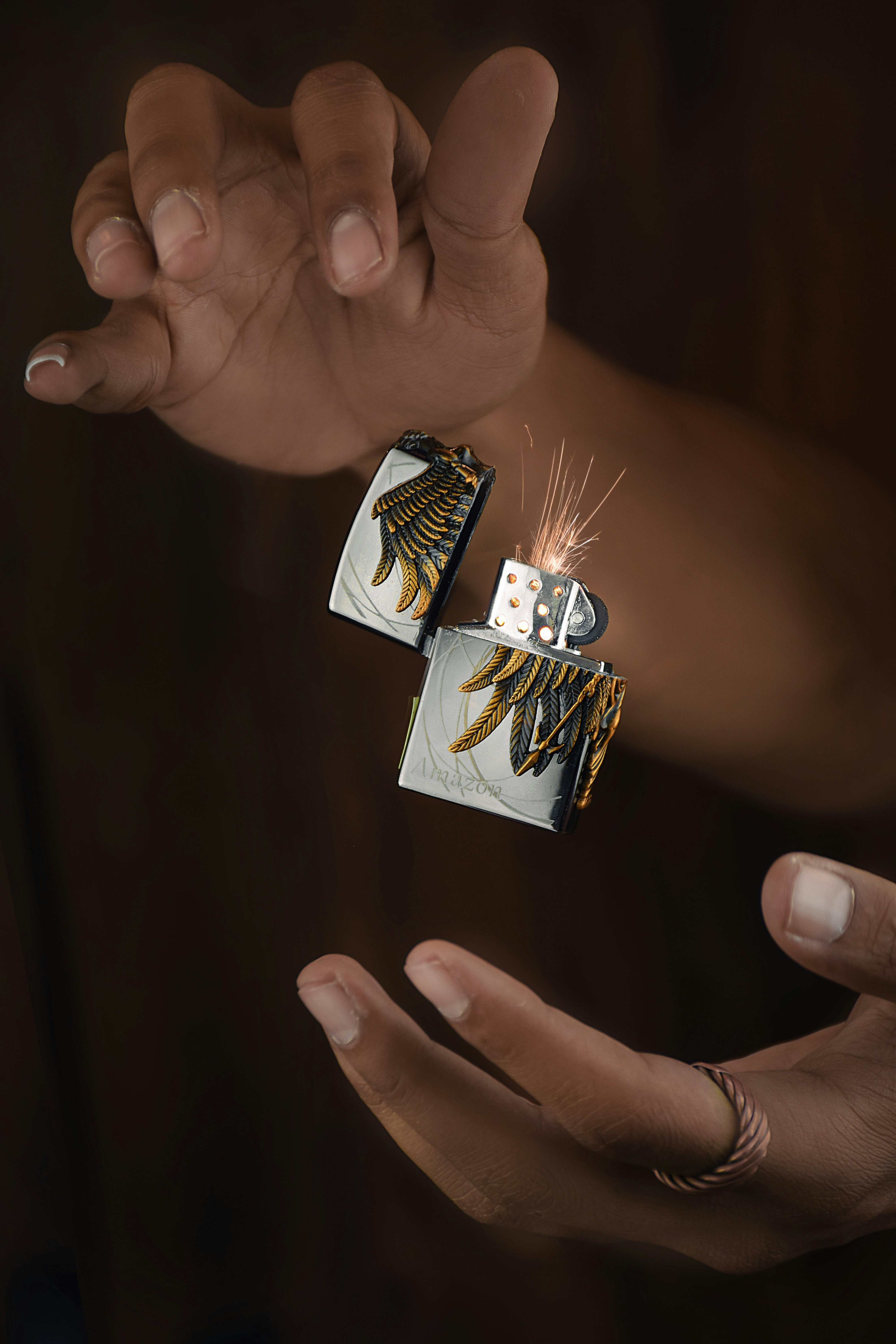 a pair of hands holding a small card with a picture of a house