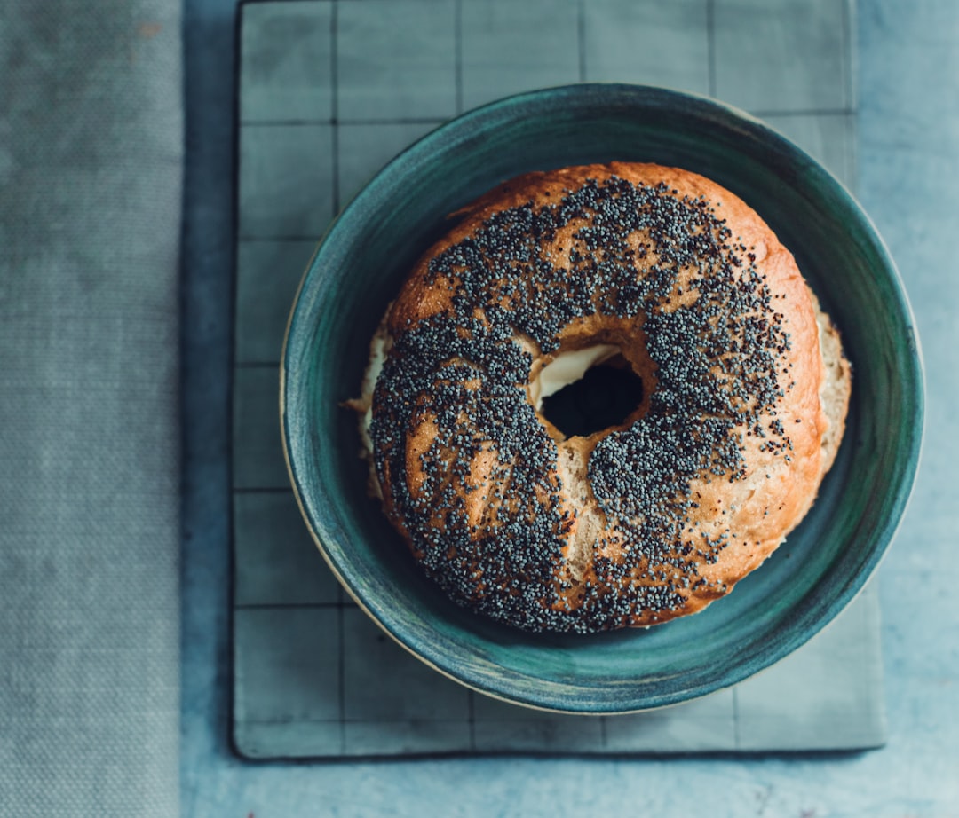 a donut in a pan, bagels