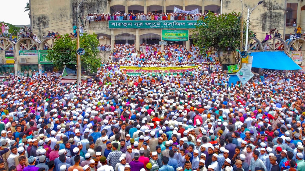 a large crowd of people outside a building