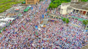 a large group of people in a street