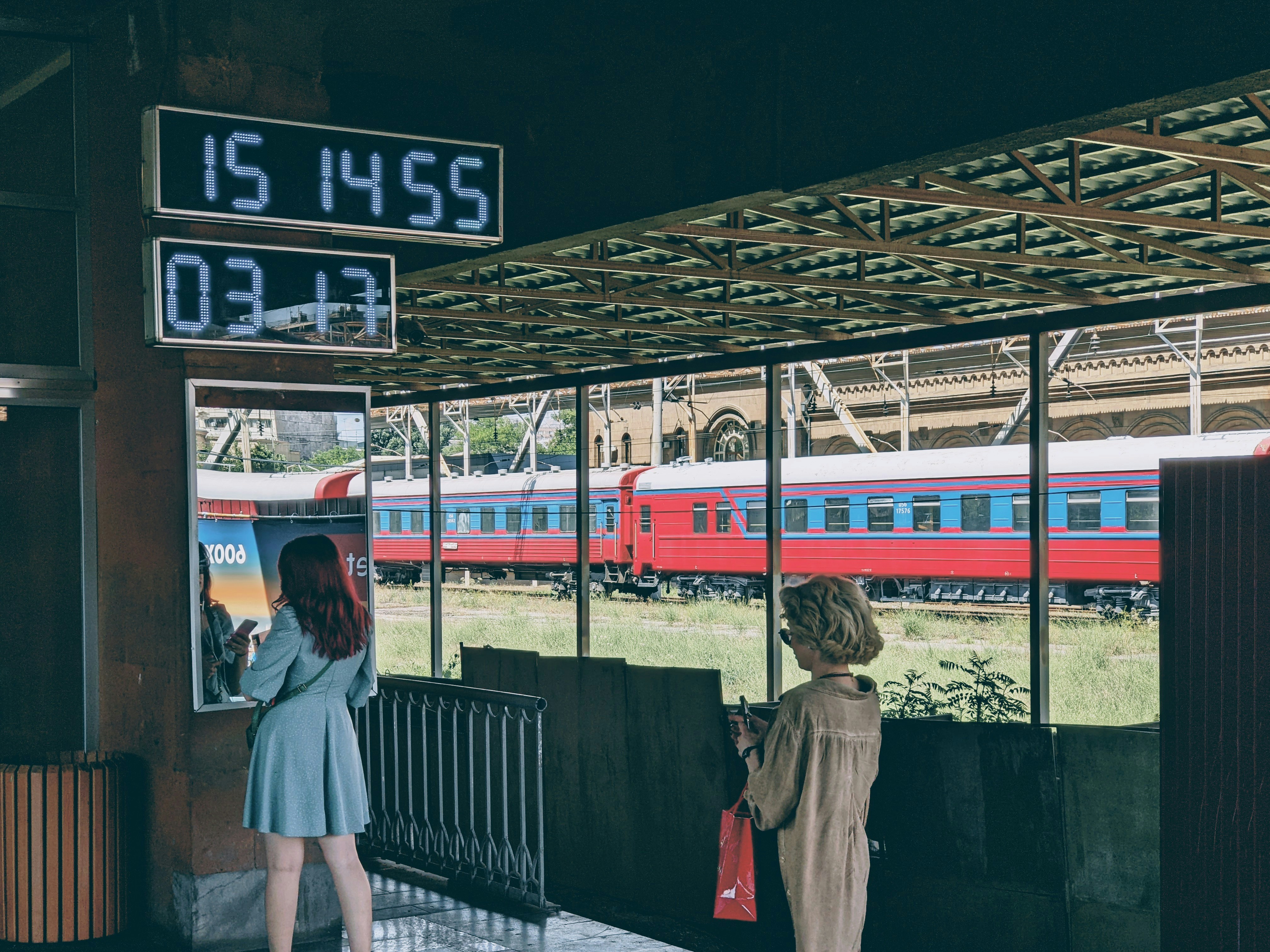 a couple of women stand near each other