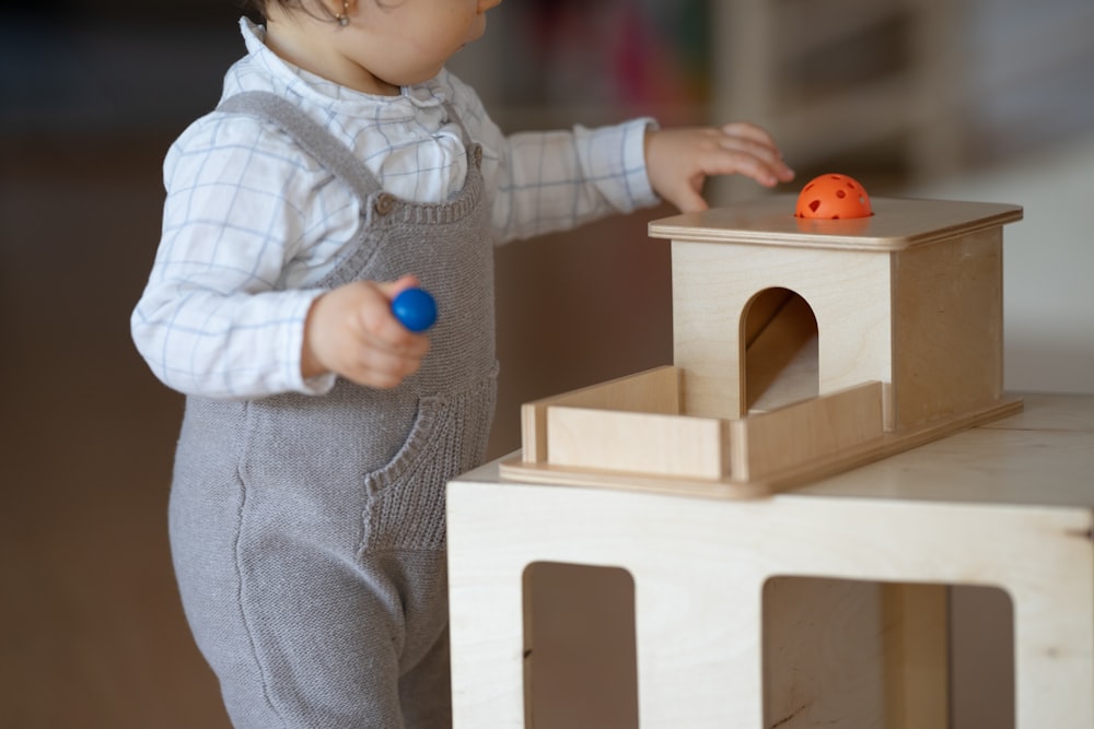 a child playing with a toy